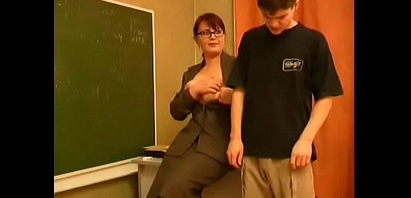  Russian big-titted brunette teacher with glasses cheats with her student in classroom [1]